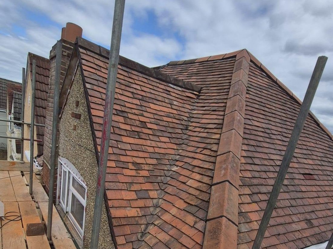 Re-roof in progress with scaffold