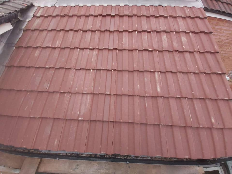 Fresh interlocking tiles re-laid on a single roof slope by Shoreside Roofing