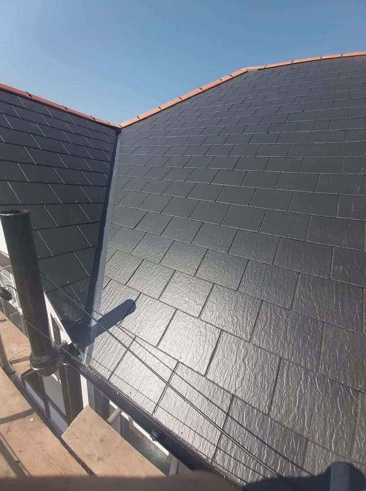 Finished slate roof in the sun